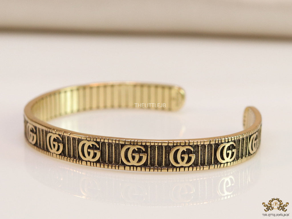 Open Gold plated double G motif bracelet in antique finish