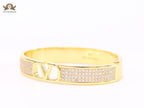 Alphabet V cz and gold bracelet