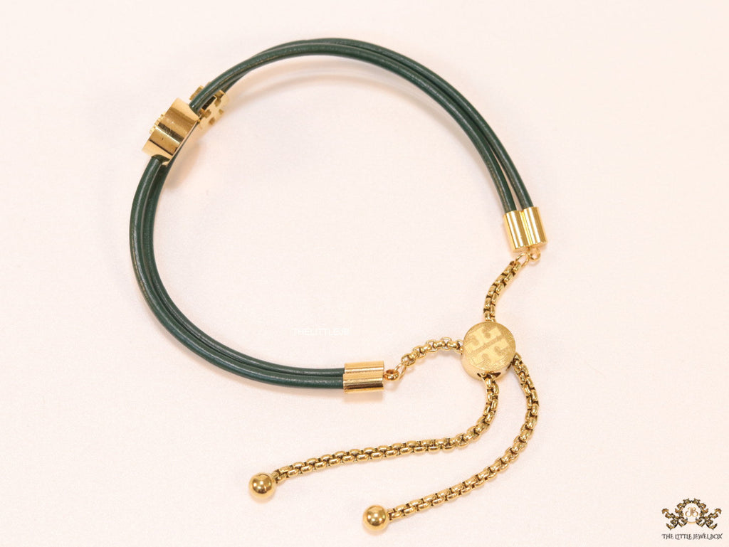 Adjustable double string green bracelet with twin T motifs