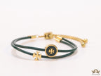 Adjustable double string green bracelet with twin T motifs