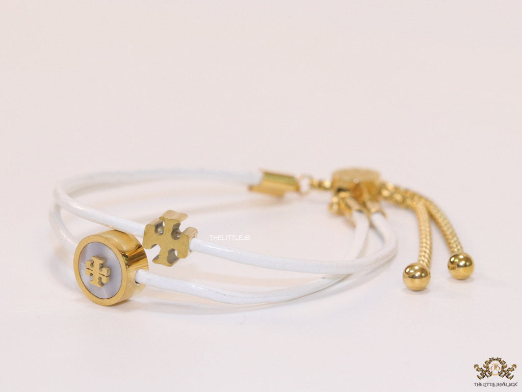 Adjustable double string white bracelet with twin T motifs