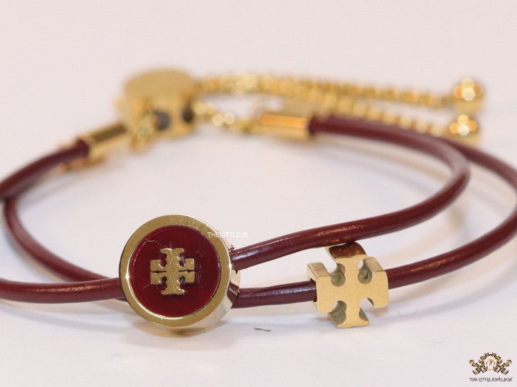 Adjustable double string maroon bracelet with twin T motifs