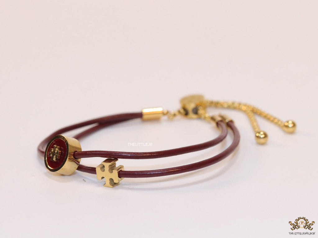 Adjustable double string maroon bracelet with twin T motifs