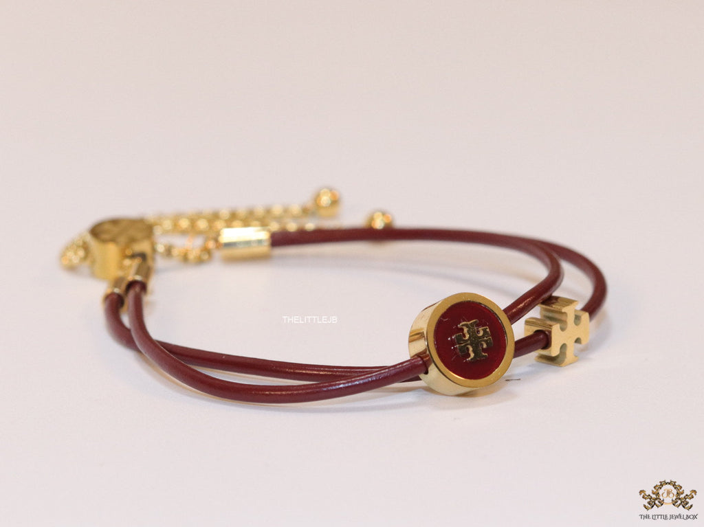 Adjustable double string maroon bracelet with twin T motifs