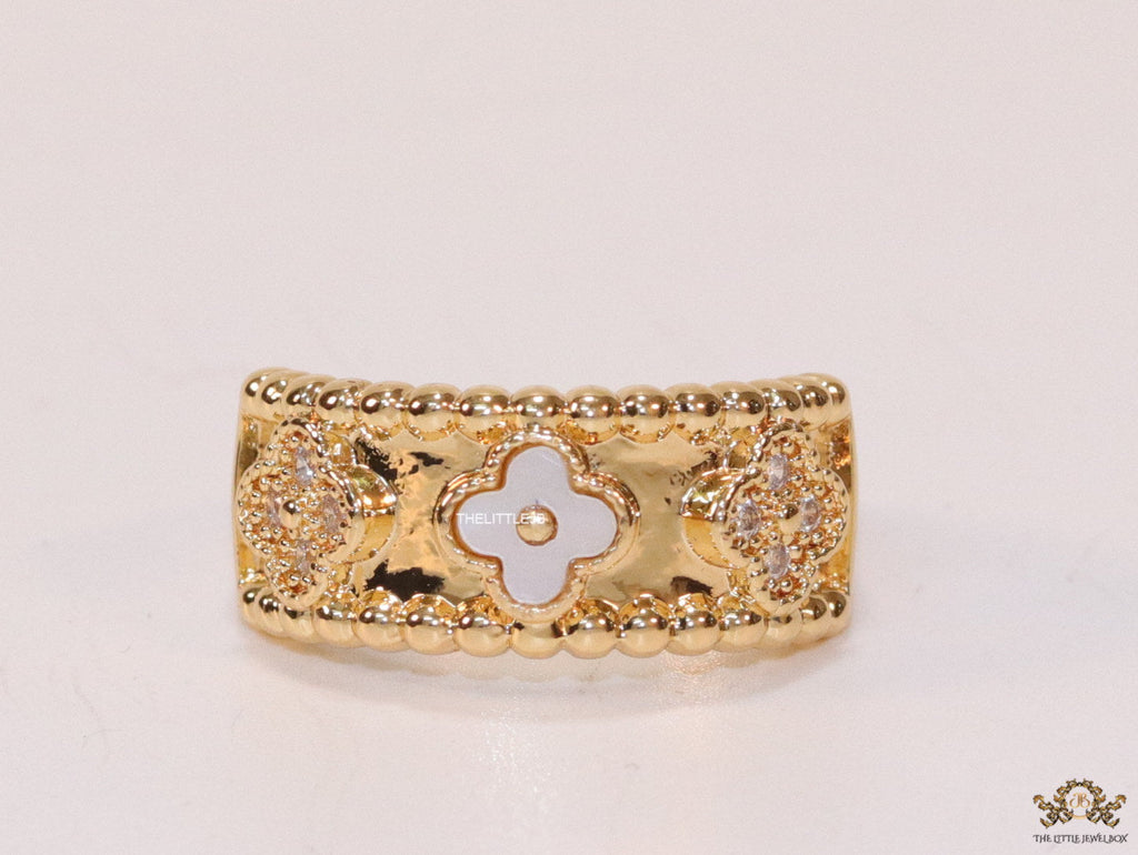 Golden ring band with MOP and cz clovers