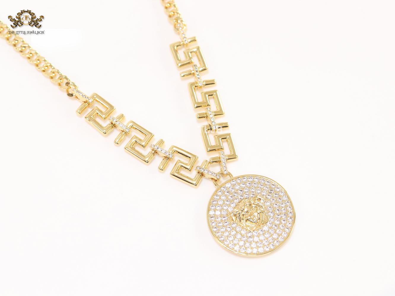 Medusa round pendant with gold link chain