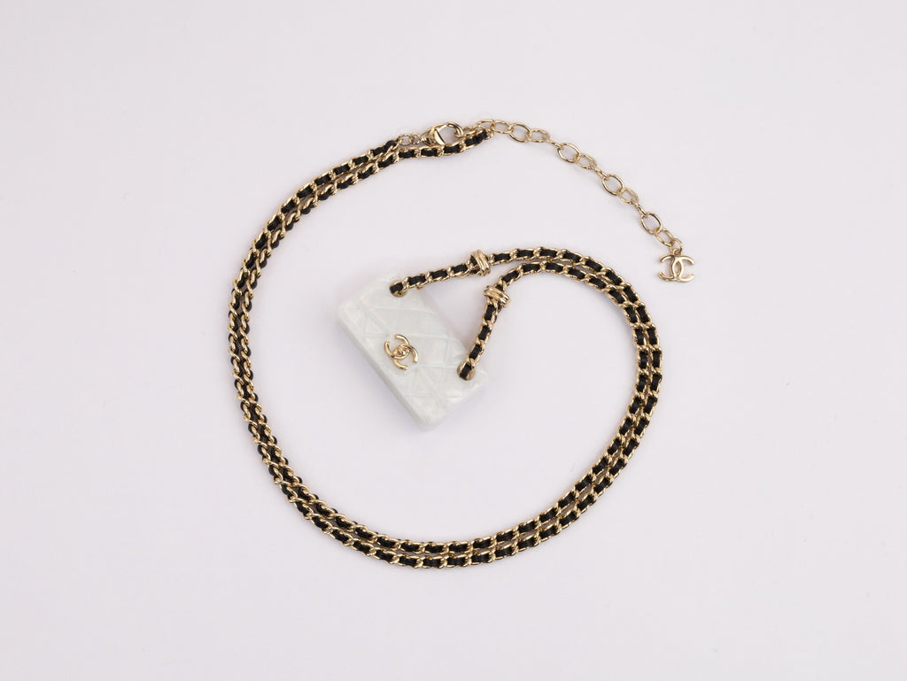 Double C enamel Bag on a black and gold chain