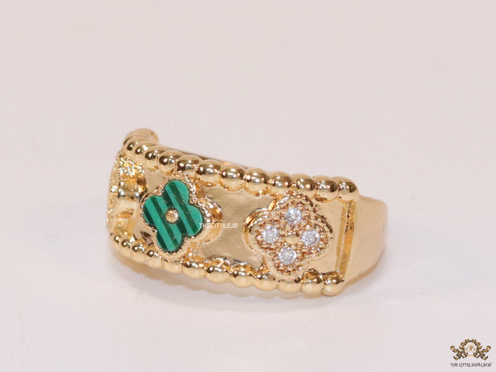 Golden ring band with malachite green and cz clovers