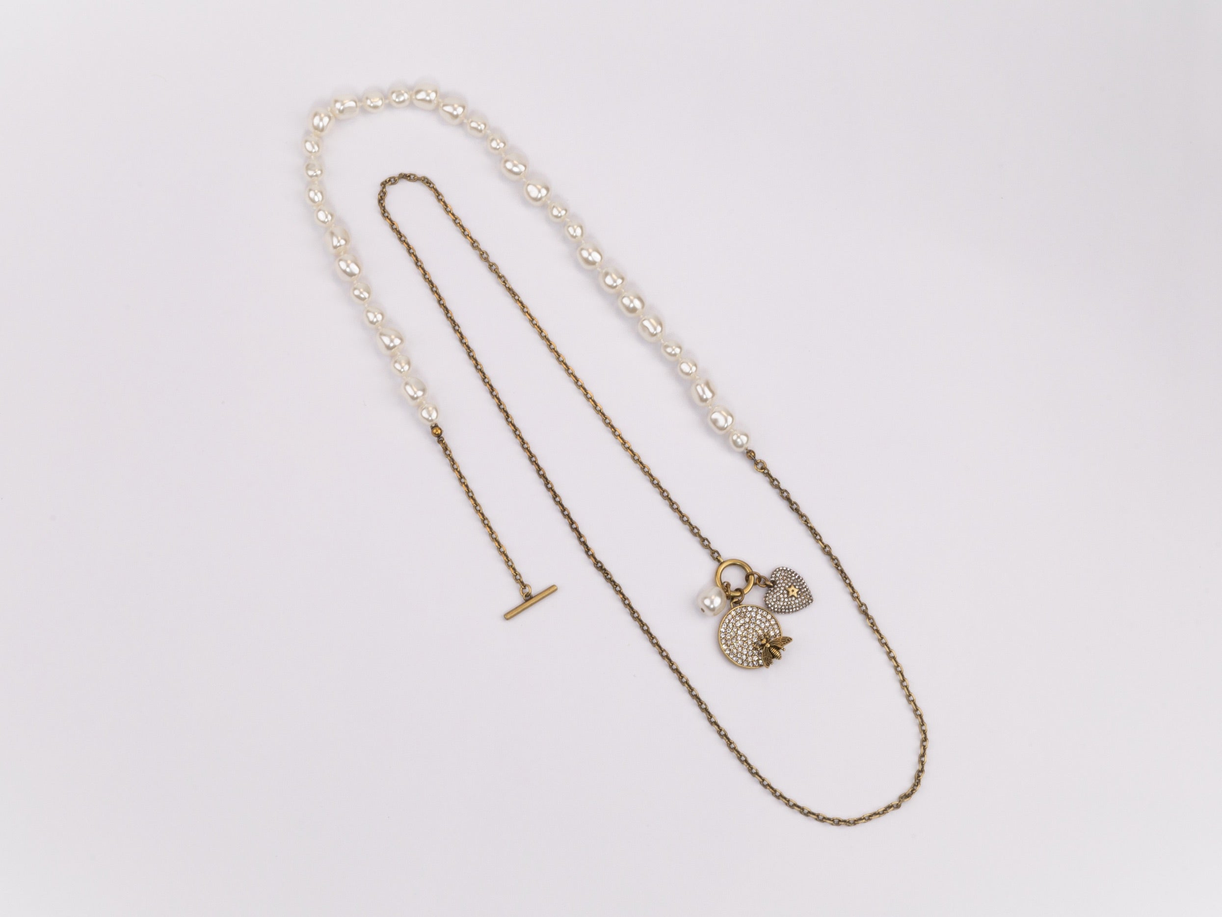 Rustic copper and pearl dragonfly and charms long chain