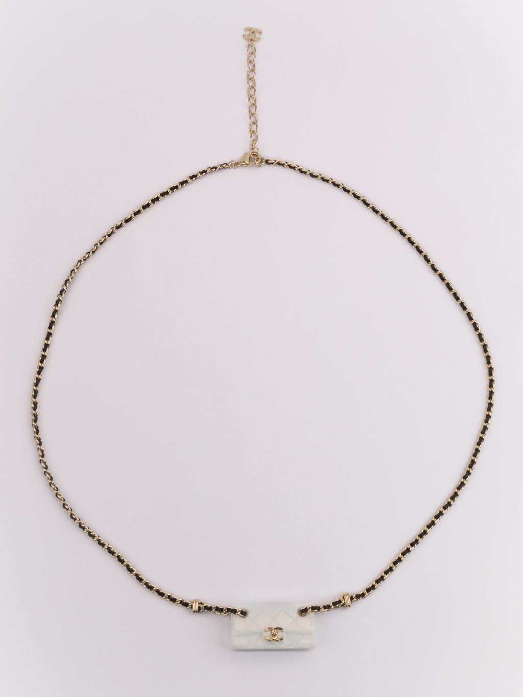 Double C enamel Bag on a black and gold chain