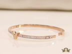 Alphabet V motif rose gold plated cz bracelet