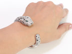 Panther cz platinum bracelet with emerald green stones