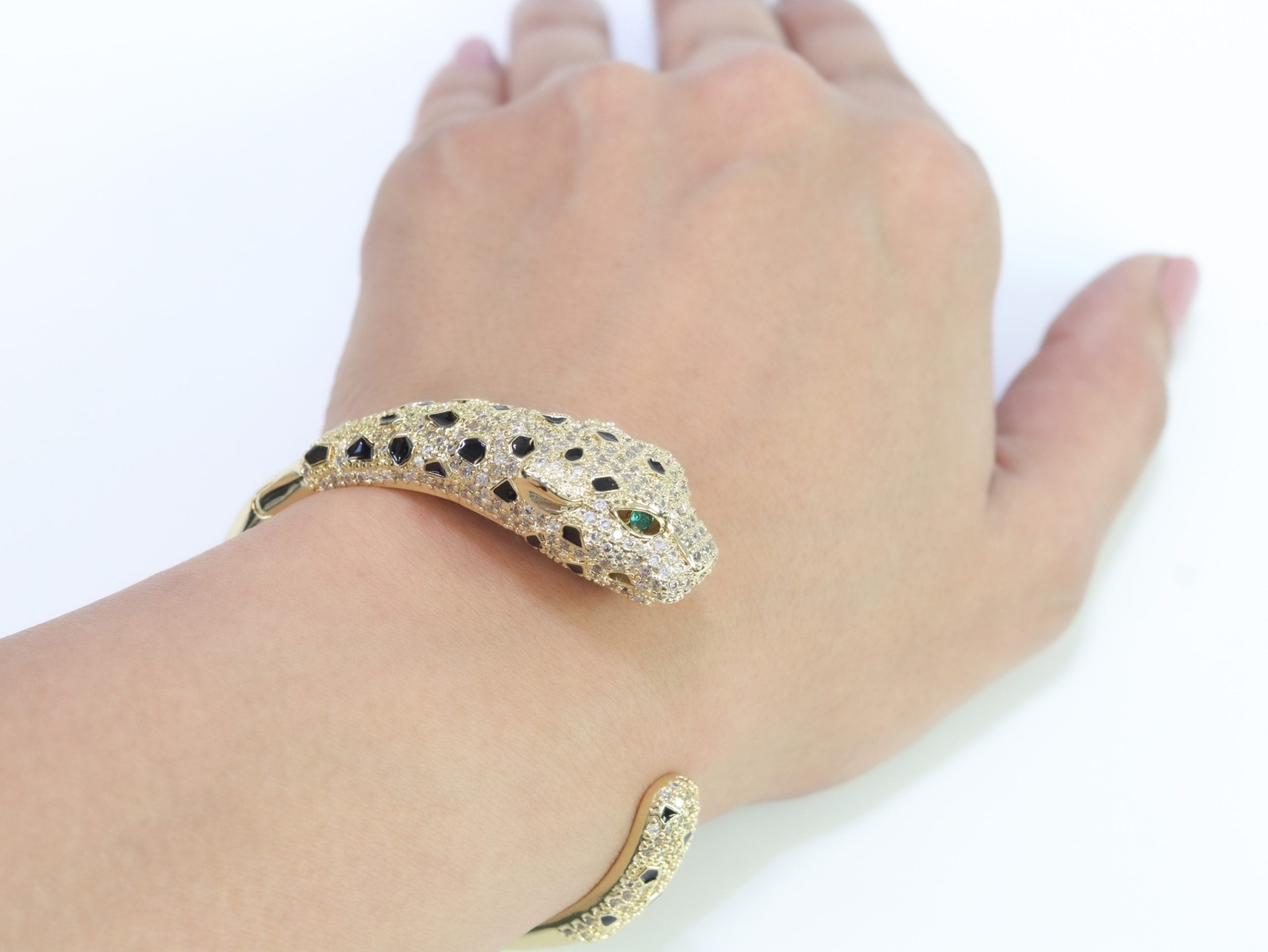 Panther cz gold bracelet with emerald green stones