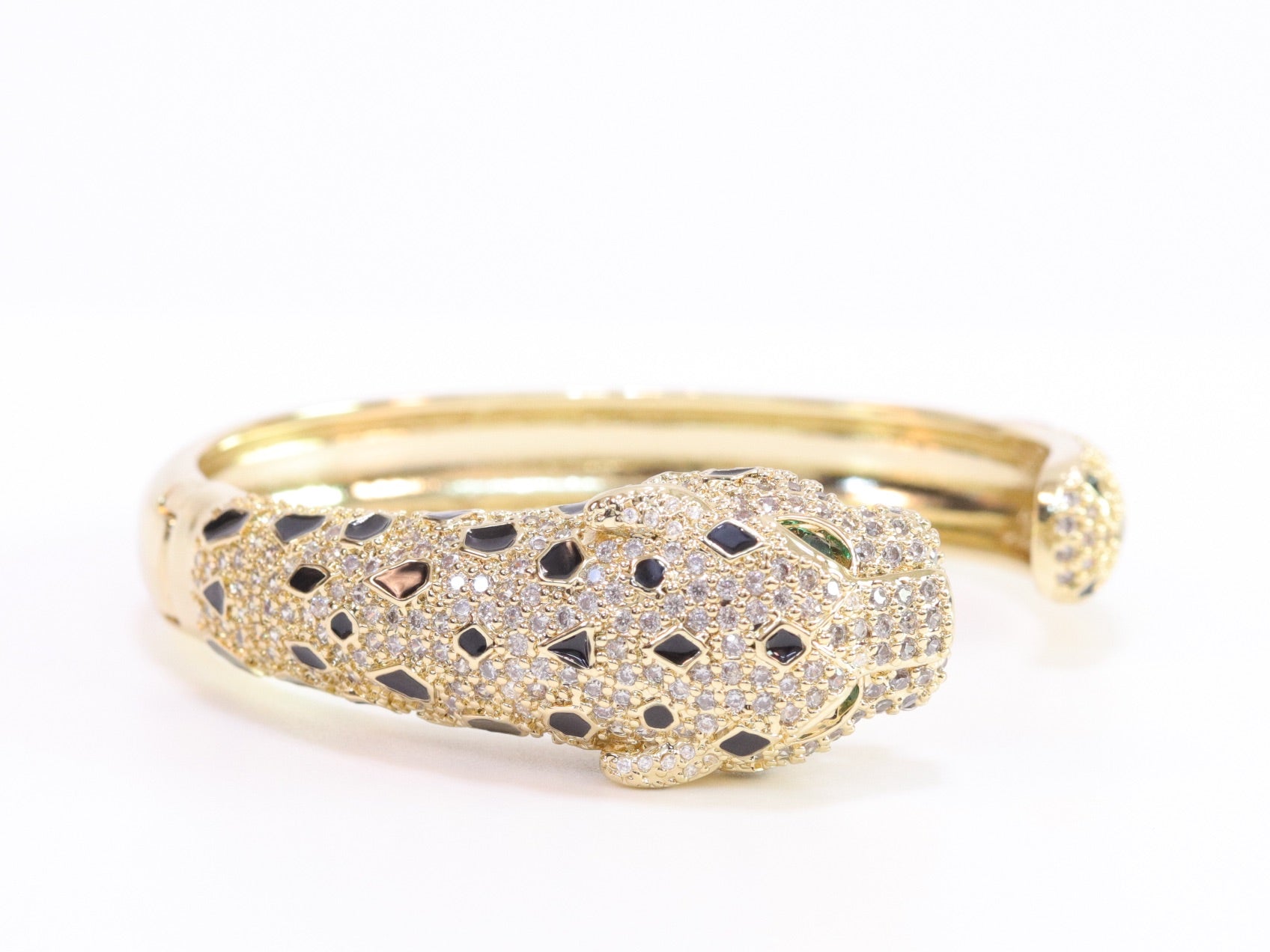 Panther cz gold bracelet with emerald green stones