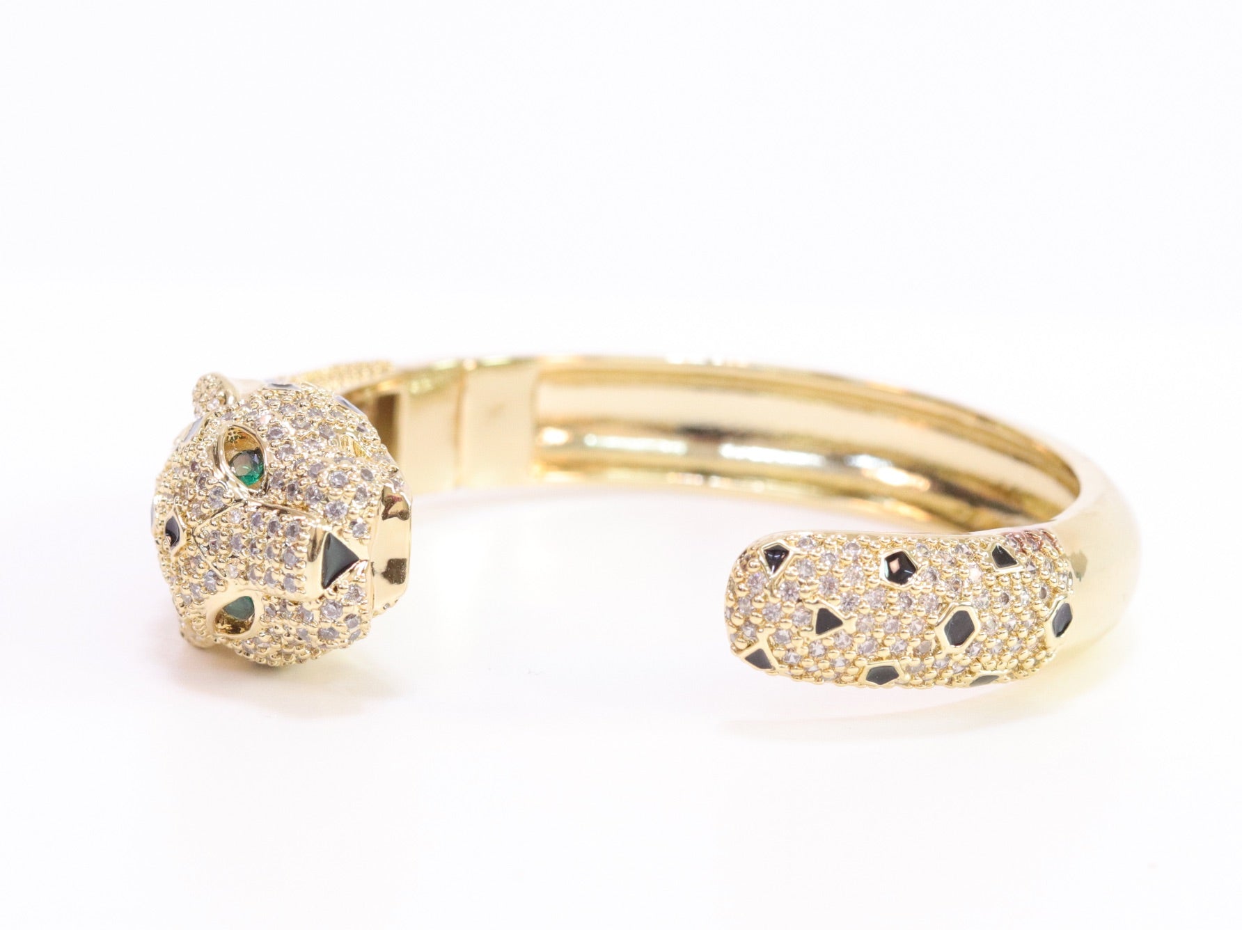 Panther cz gold bracelet with emerald green stones