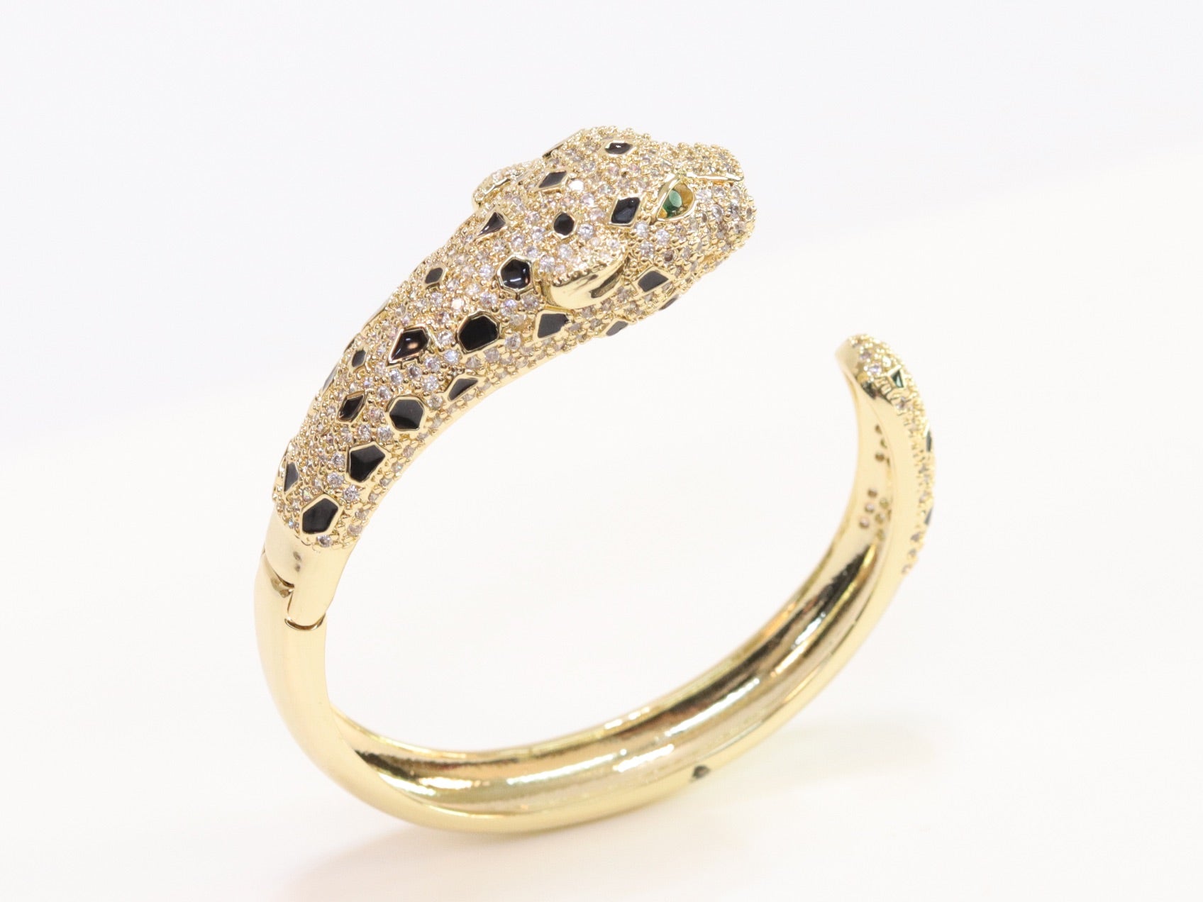 Panther cz gold bracelet with emerald green stones