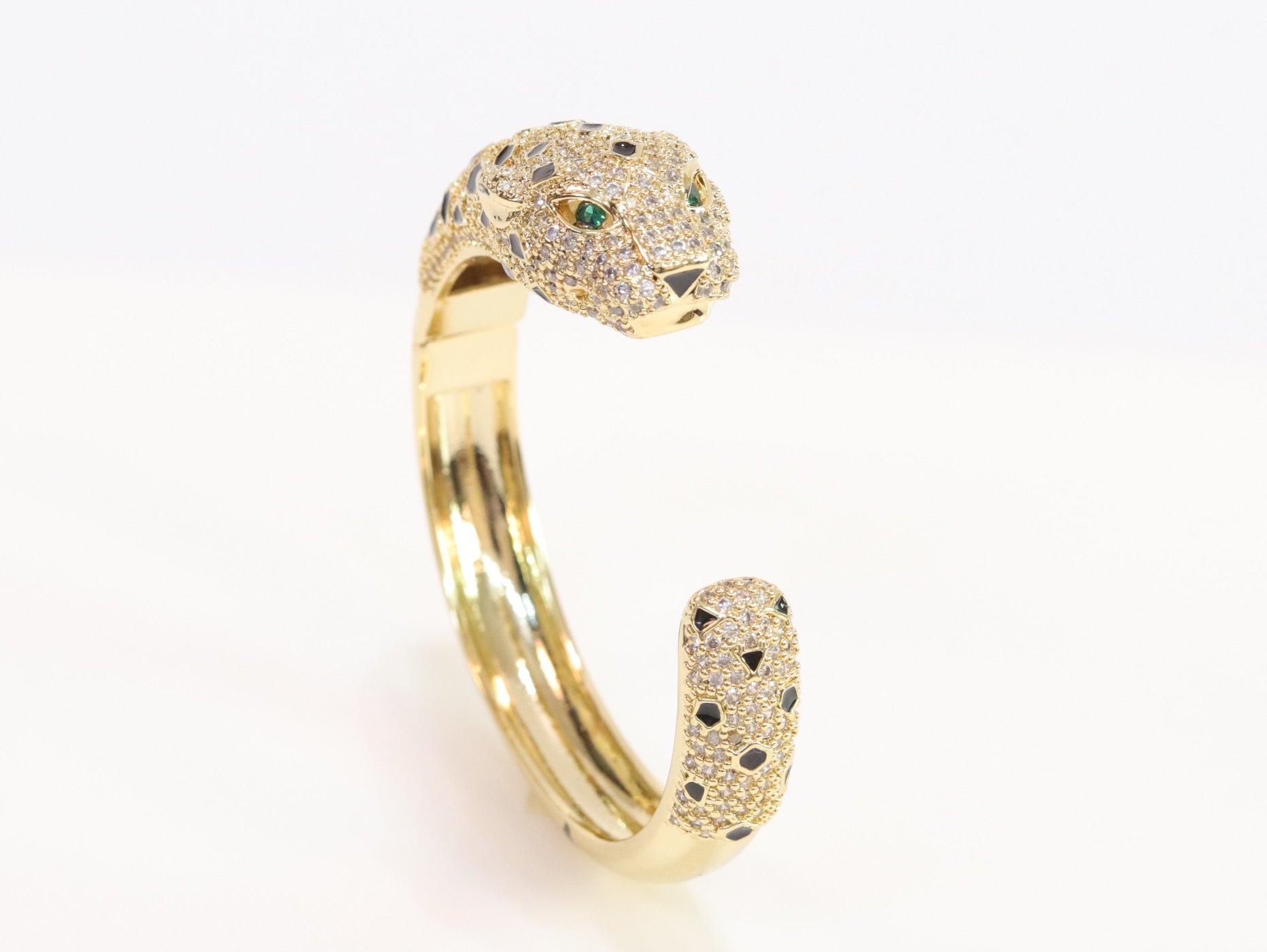 Panther cz gold bracelet with emerald green stones