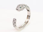 Panther cz platinum bracelet with emerald green stones