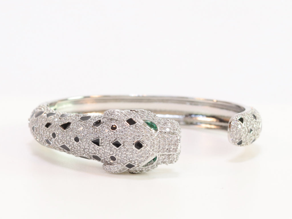 Panther cz platinum bracelet with emerald green stones