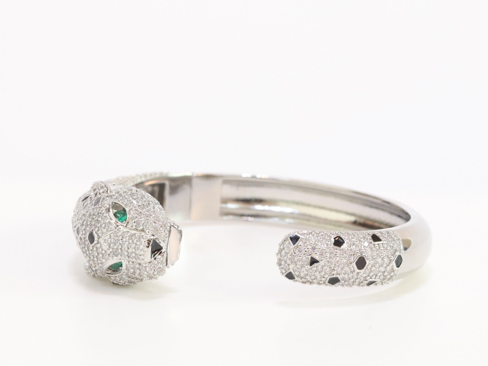 Panther cz platinum bracelet with emerald green stones