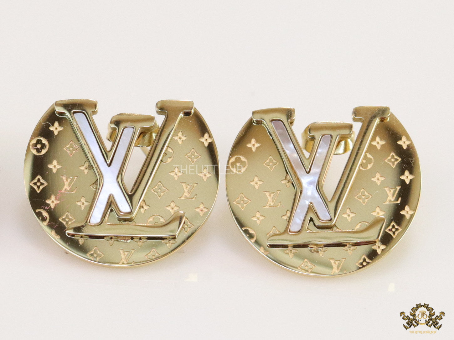 Gold plated stud earrings with alphabet motifs
