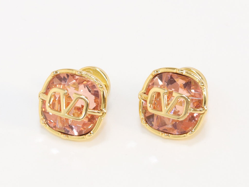 Alphabet V copper pink cz studs
