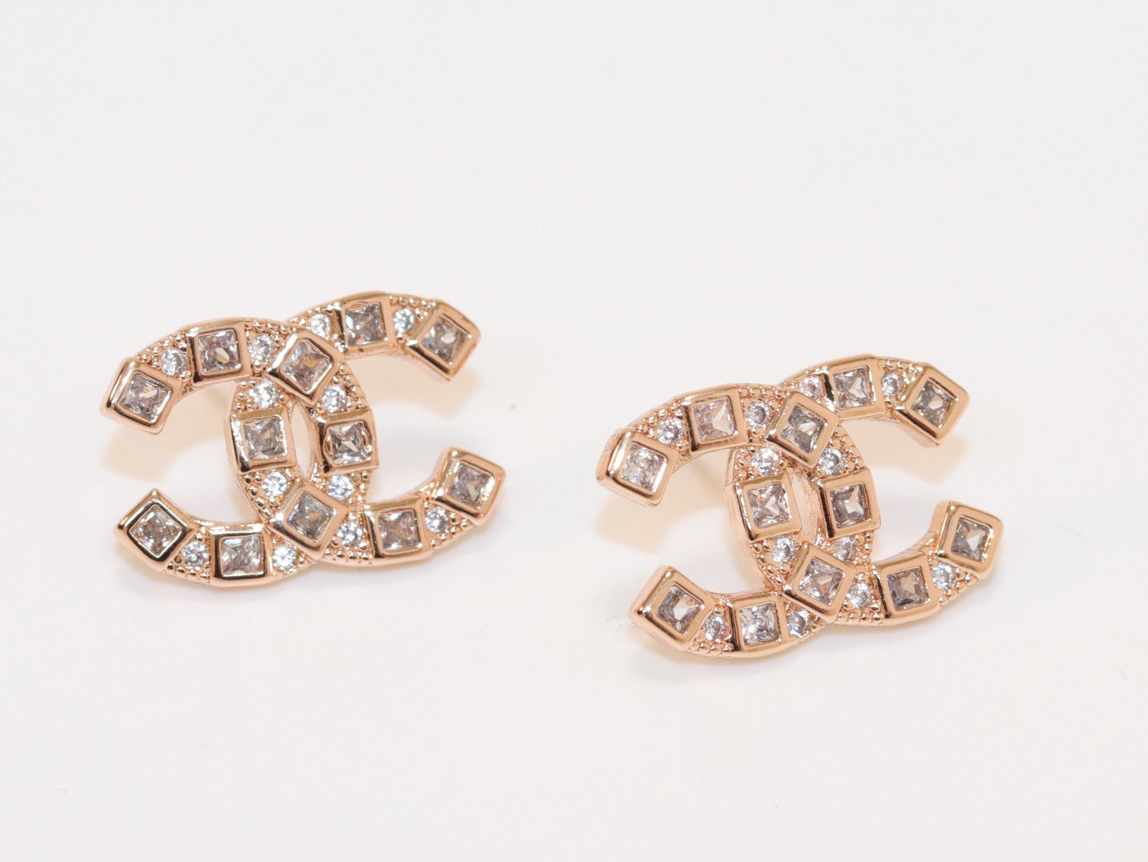 Double C rose gold studs