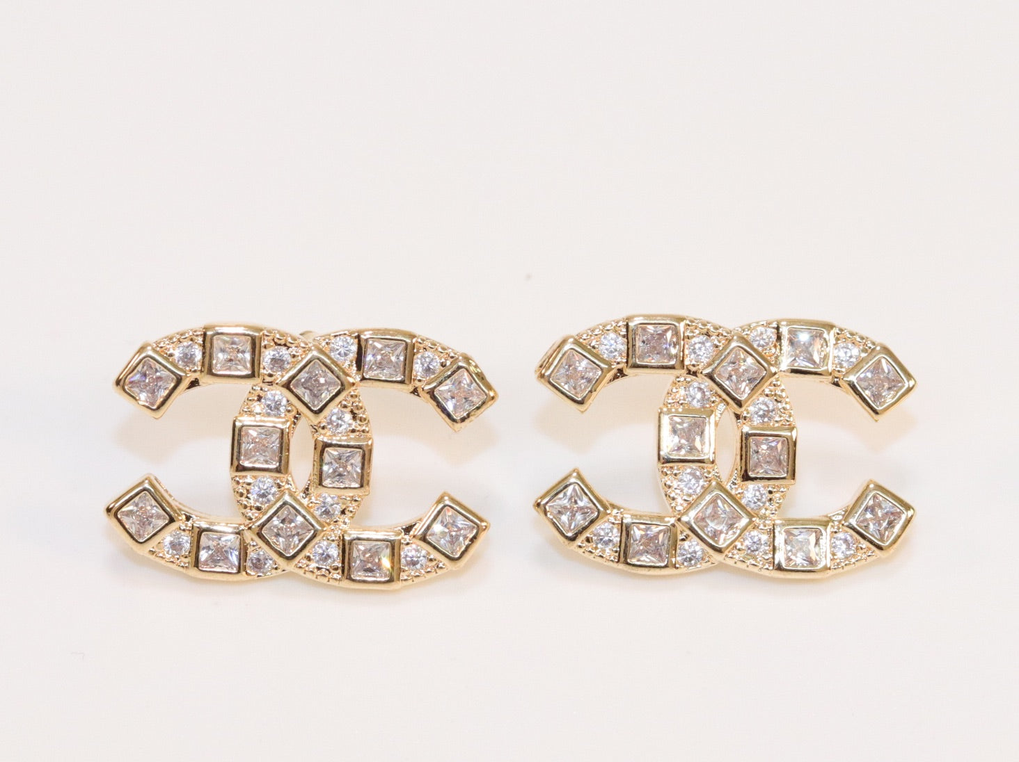 Double C gold studs
