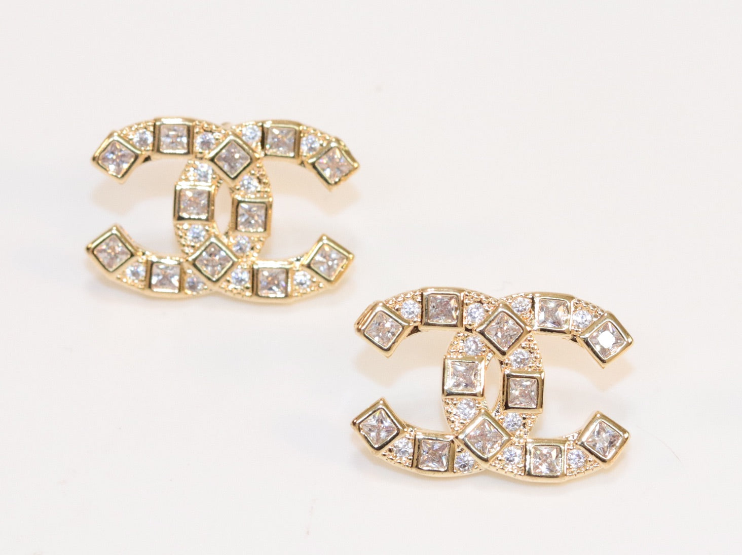 Double C gold studs