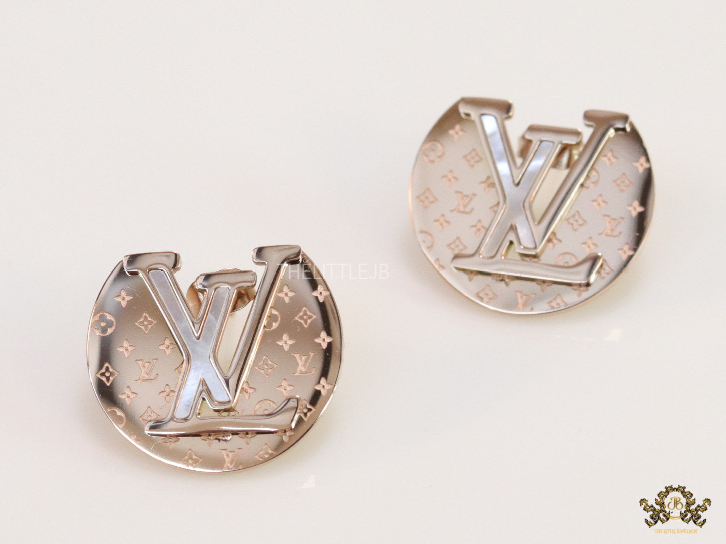 Rose gold plated stud earrings with alphabet motifs