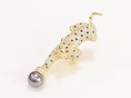 Gold panther with grey pearl and cz brooch