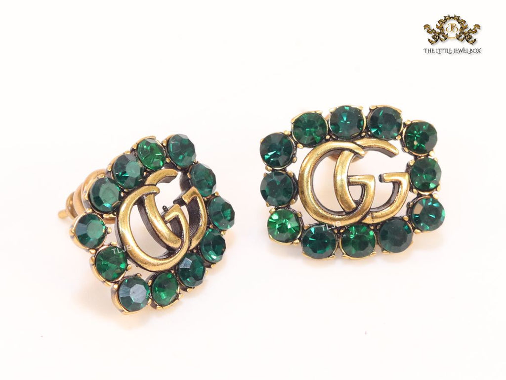 Double G emerald stones studs