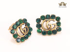 Double G emerald stones studs