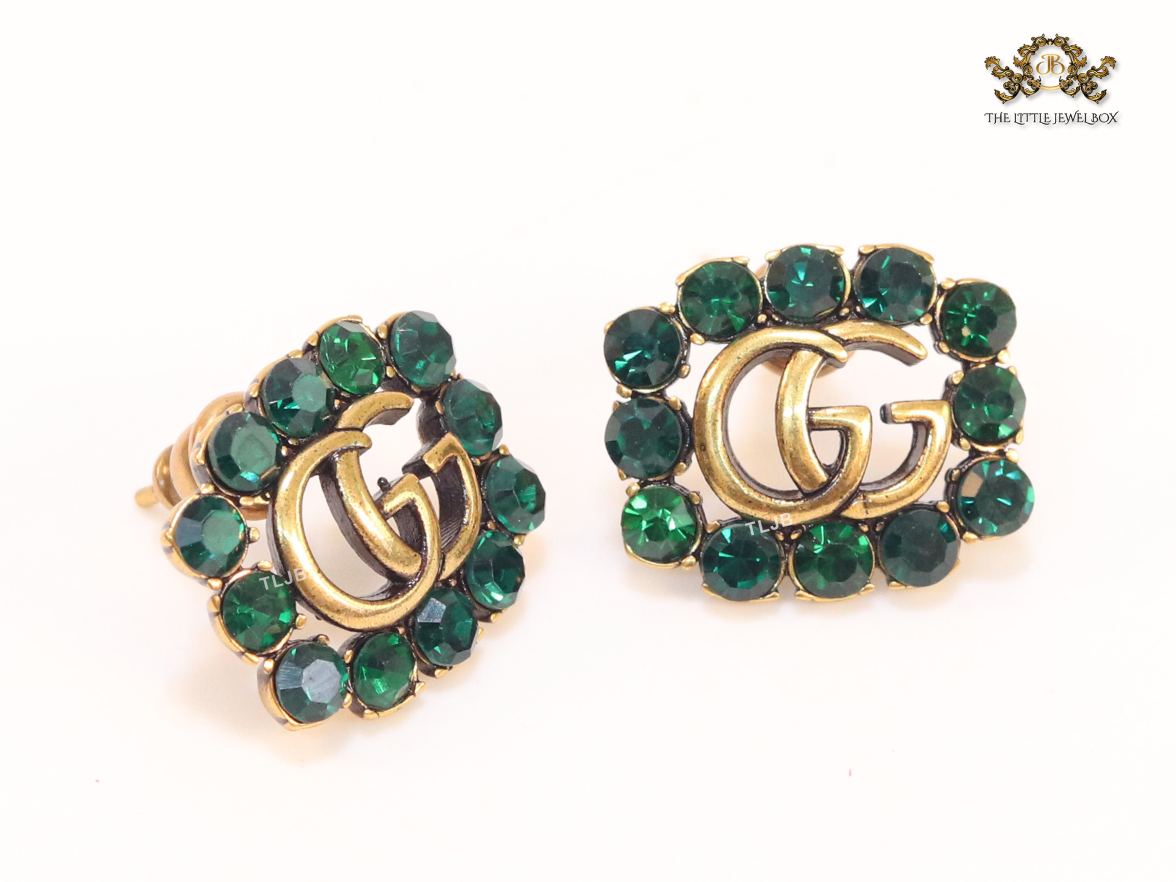 Double G emerald stones studs