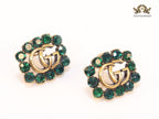 Double G emerald stones studs