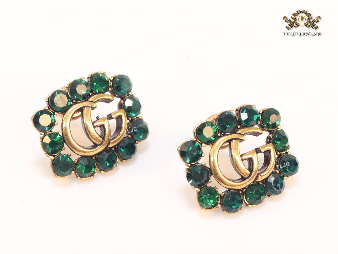 Double G emerald stones studs