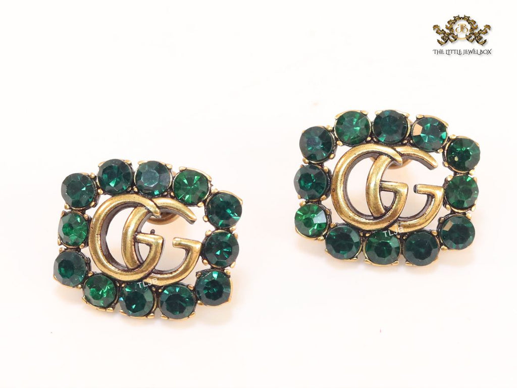 Double G emerald stones studs