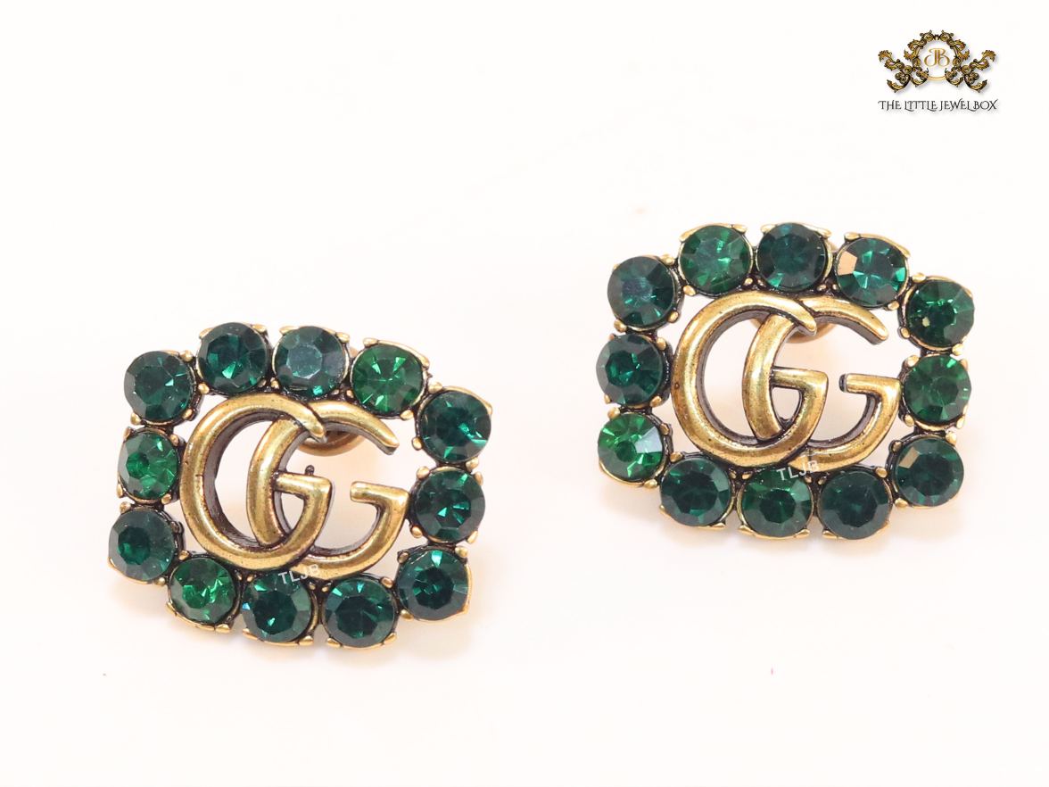 Double G emerald stones studs