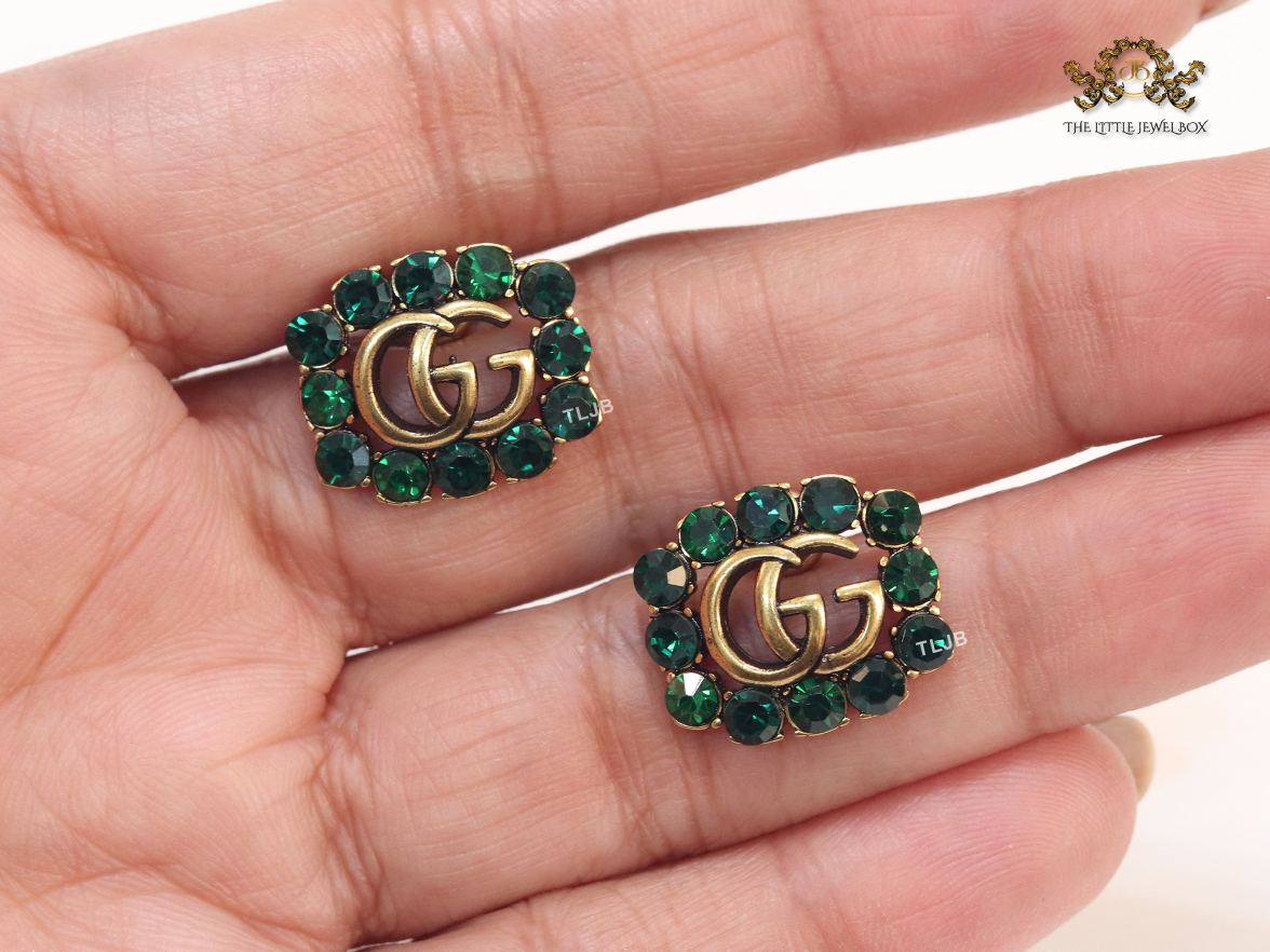 Double G emerald stones studs