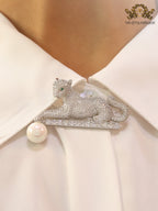 Platinum panther with white pearl, cz and emerald stones brooch