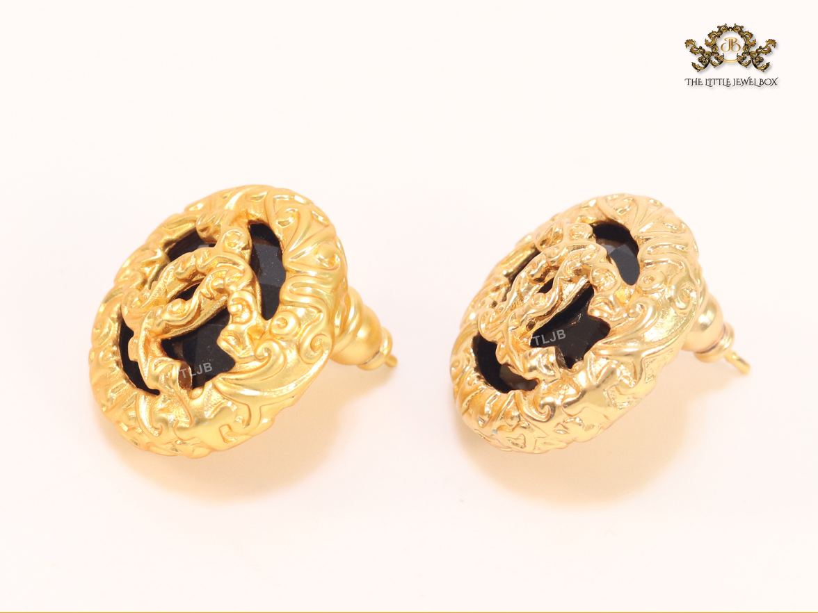 Black and gold double C studs