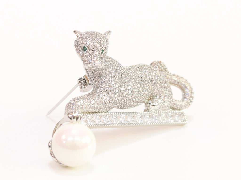 Platinum panther with white pearl, cz and emerald stones brooch