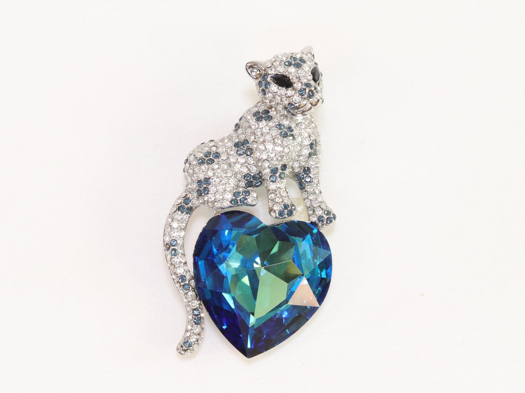 Panther on heart-shaped London blue topaz brooch