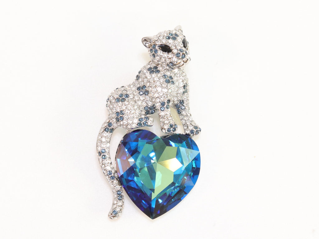 Panther on heart-shaped London blue topaz brooch