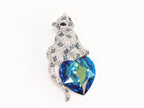 Panther on heart-shaped London blue topaz brooch