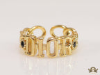 Gold plated alphabet open ring with black cz