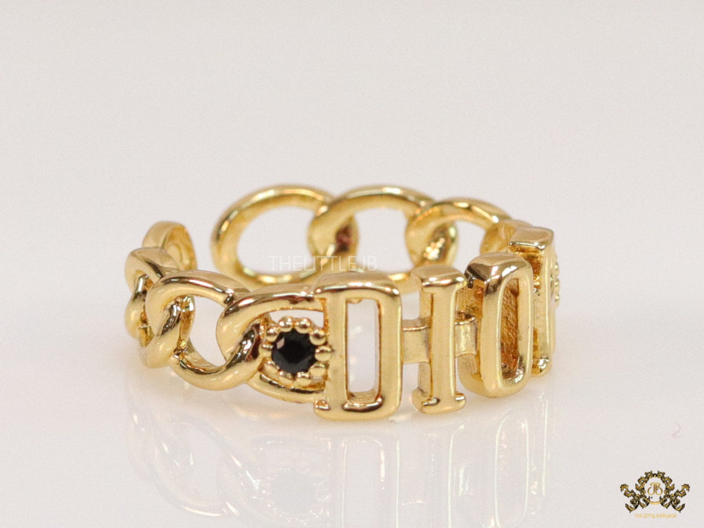 Gold plated alphabet open ring with black cz