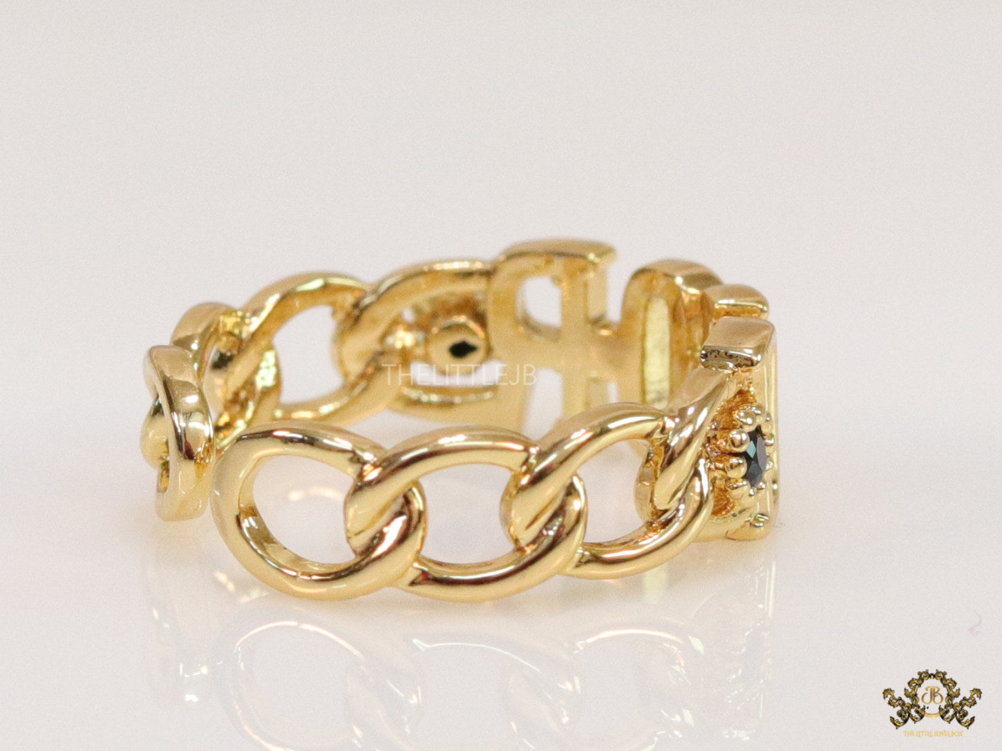 Gold plated alphabet open ring with black cz