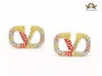 Alphabet V multi coloured studs