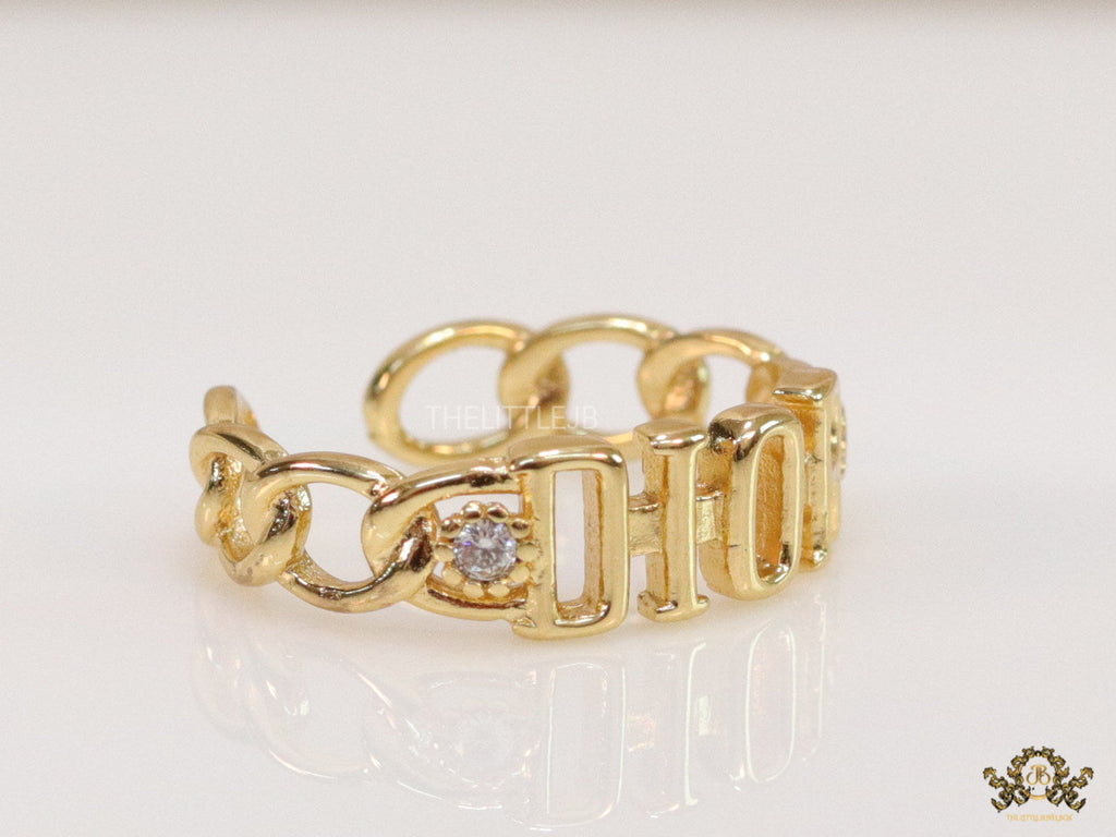 Gold plated alphabet open ring with white cz
